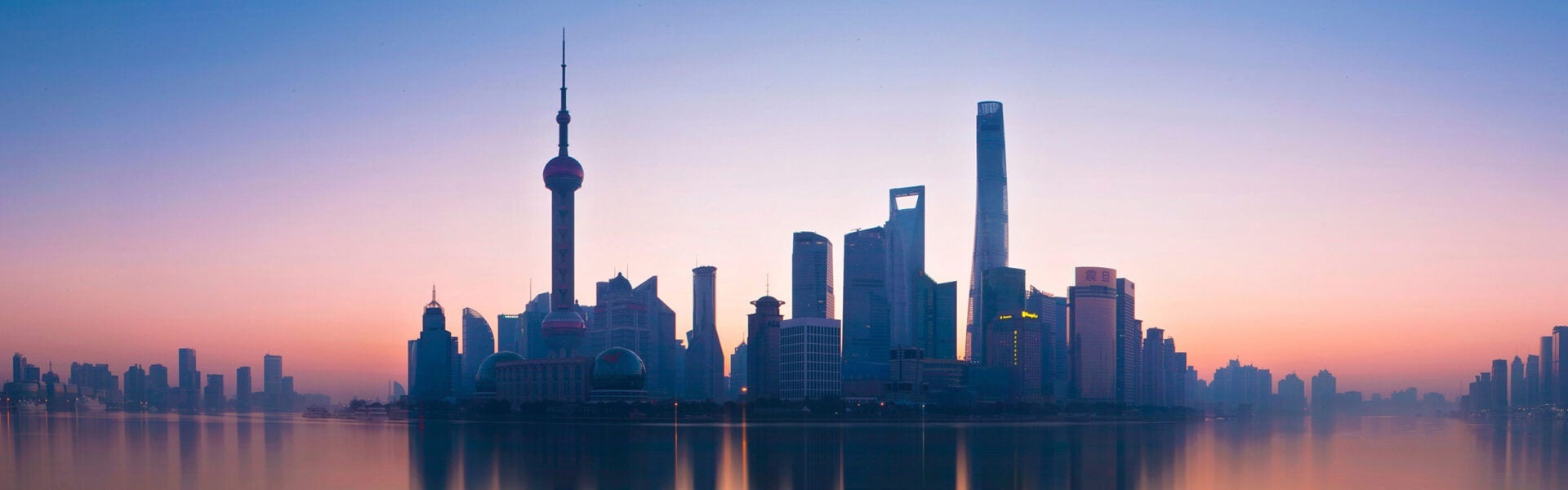 View of Shanhai China reflecting over the water.